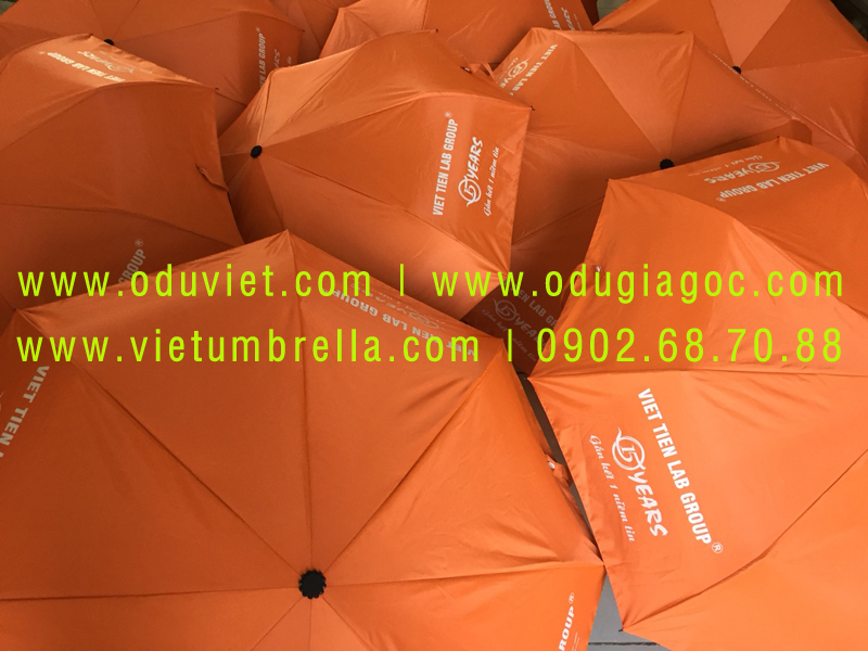 xưởng sản xuất ô dù cầm tay in logo quảng cáo